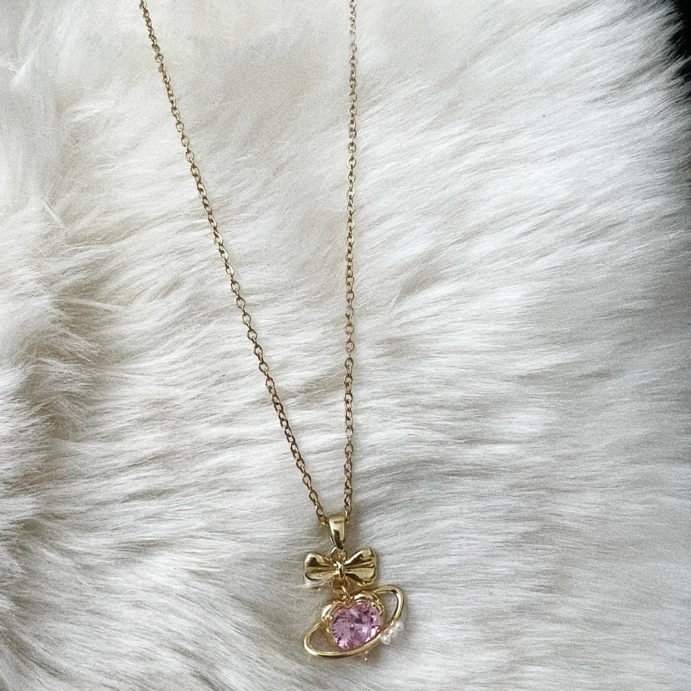 Saturn Bow Necklace